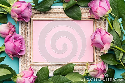 Happy Mother`s Day, Women`s Day or Birthday Flat Lay Background. Beautiful wooden vintage picture frame, fresh pink roses. Stock Photo