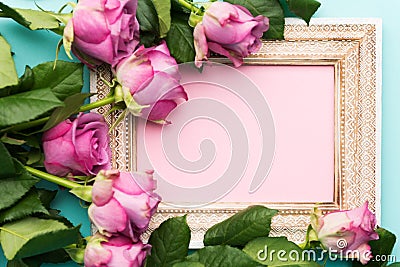 Happy Mother`s Day, Women`s Day, Valentine`s Day or Birthday Flat Lay Background. Beautiful wooden vintage picture frame and roses Stock Photo