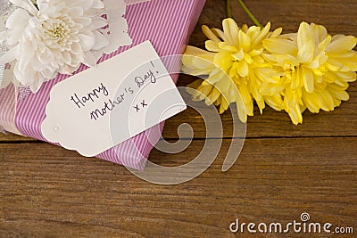 Happy mothers day card on gift box with flowers Stock Photo