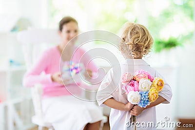 Happy mothers day. Child with present for mom Stock Photo