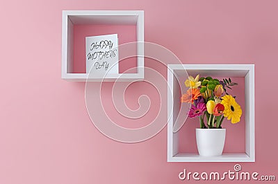 Happy mothers day greeting display flowers Stock Photo