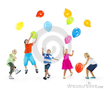 Happy Multi-Ethnic Children Playing Balloons Stock Photo