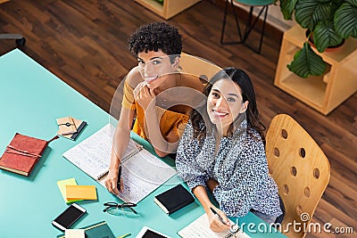 Happy multiethnic girl studying together Stock Photo