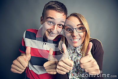 Happy nerdy couple Stock Photo