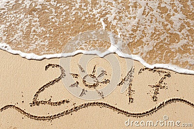 Happy New Year 2017 on the beach Stock Photo