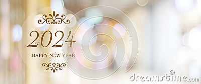 Happy New Year 2024 on blur abstract bokeh background with copybspace for text, new year greeting card, banner Stock Photo