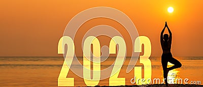 Happy new year card 2023. Silhouette lifestyle woman yoga practicing yoga standing as part of Number 2023 Stock Photo