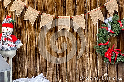 Happy New Year card with snowman and wreath Stock Photo