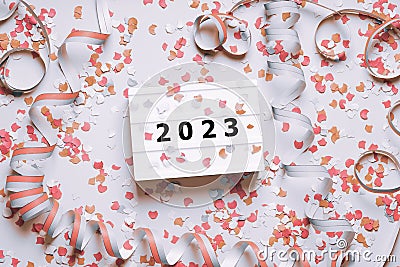 happy new year 2023 celebration flat lay with confetti and streamers Stock Photo
