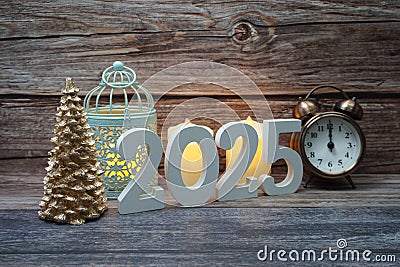 Happy New Year 2025 and Christmas Holiday Decoration on wooden background Stock Photo