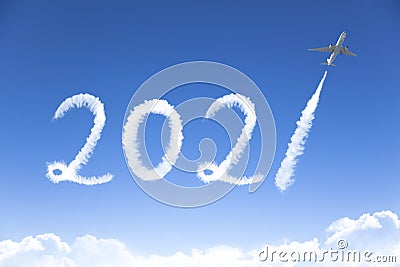 Happy New year 2021 concept. cloud drawing by airplane in sky Stock Photo