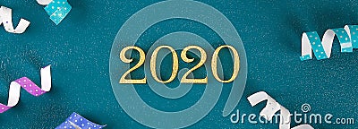 Happy New Year 2020. Creative text Happy New Year 2020 written in gold wooden letters. Banner Stock Photo