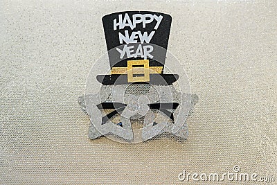 Happy New year glasses on gold glitter background. Stock Photo