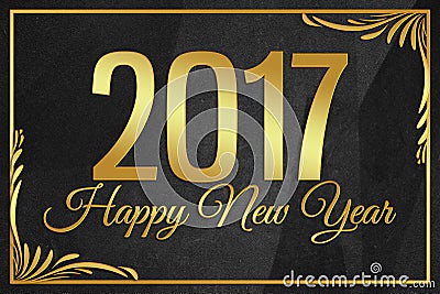 Happy New Year 2017 gold word on black wrinkled paper background Stock Photo