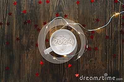 Happy New Year 2024 holidays drink. Christmas cup of coffee Stock Photo