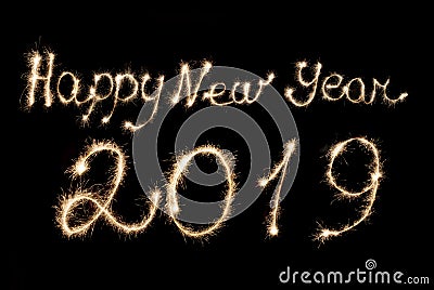 Happy New Year 2019 inscription sparklers . Stock Photo