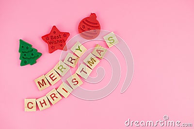 Happy New Year and Merry Christmas. Scrabble letters, playdough and plasticine. Letter tiles spelling celebration holiday Stock Photo