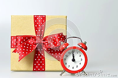 Happy New Year: Midnight clock and gift box Stock Photo