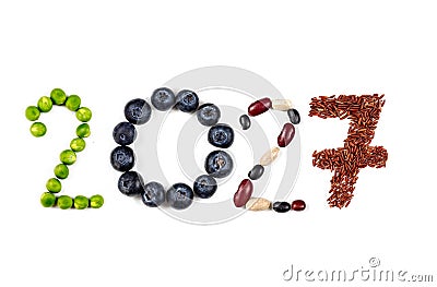 Happy New Year 2027 number made of fruits and vegetable on white Stock Photo