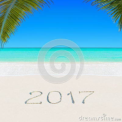 Happy New Year 2017 on sandy ocean tropical palm beach Stock Photo