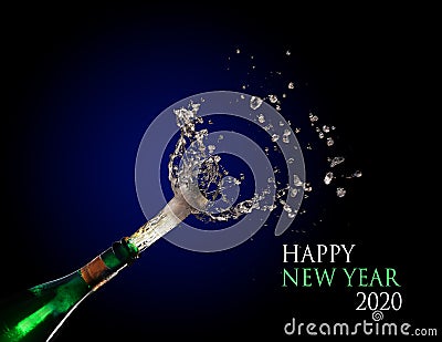 Happy New Year 2020 text and a champagne bottle exploding and shooting out the cork with splashes against a dark blue background, Stock Photo
