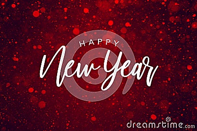 Happy New Year Text Over Red Sparkle Glitter Background. Magical Holiday Calligraphy Font with Glowing Defocused Bokeh Lights Back Stock Photo