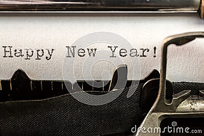 Happy New Year text written by old typewriter Stock Photo