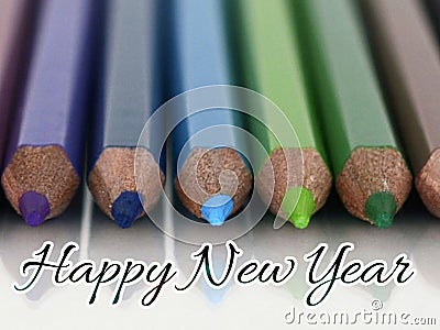 Happy New Year 2025 Typography And Calligraphy Text On Beautiful Colorful Pencil And White Background. Stock Photo