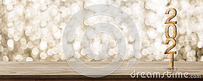 2021 happy new year wood number 3d rendering on wood table with sparkling gold bokeh wall,leave space for display of product for Stock Photo