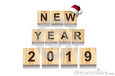 Happy New Year 2019 Words made up of alphabet on wooden cubes. Wooden background. Christmas, New Year background Stock Photo