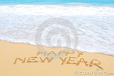 Happy New Year on the beach Stock Photo