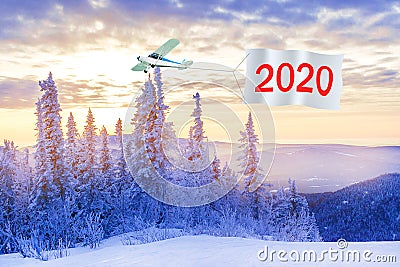 Happy New Years 2020 concept. Airplane with message number 2020 Stock Photo