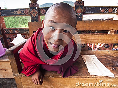 Happy novice monk of Punakha Dzong , Bhutan Editorial Stock Photo