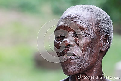 A happy old African woman with crinkle eyes Stock Photo