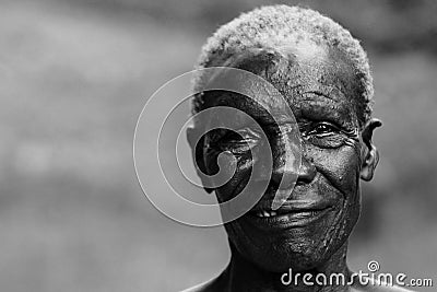 A happy old African woman with crinkle eyes Stock Photo