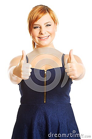 Happy overweight woman with thumbs up Stock Photo