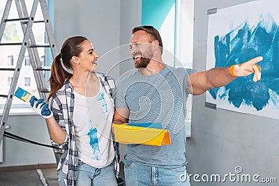 Happy painters smiling at each other Stock Photo