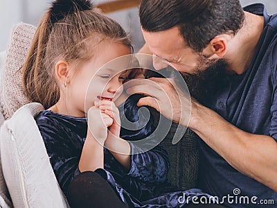 Happy parenting lifestyle father daughter smiling Stock Photo