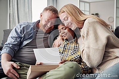 Happy parents officially adopting child Stock Photo