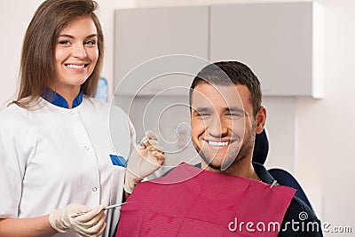 Happy patient and female dentist Stock Photo