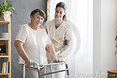 Pensioner and nurse Stock Photo