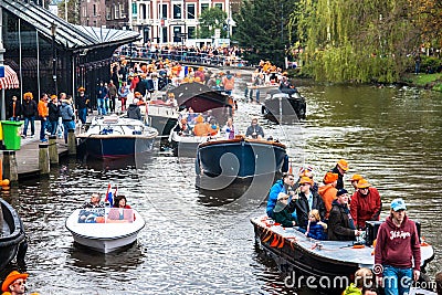 Happy people on boat at Koninginnedag 2013 Editorial Stock Photo