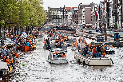 Happy people on boat at Koninginnedag 2013 Editorial Stock Photo