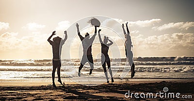 Happy people jump with joy and happiness during summer holiday vacation together in friendship having fun - silhouettes young Stock Photo