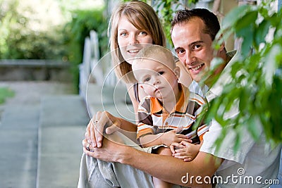 Happy perfect young family Stock Photo