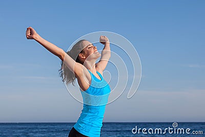 Happy person arms raised Stock Photo