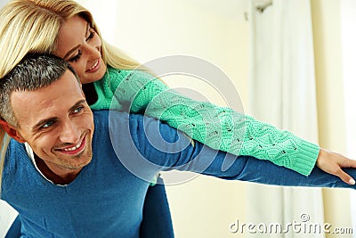 Happy person with the hands lifted upwards Stock Photo