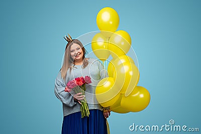 Happy plump woman with balloons Stock Photo