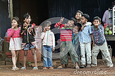 Happy poor smile children girls and boys in asia village Editorial Stock Photo