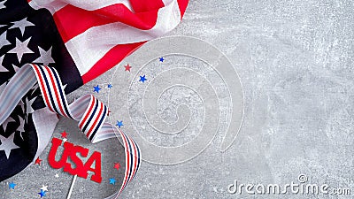 Happy Presidents day poster with American flag, grosgrain ribbon and sign USA on concrete stone background. Flat lay, top view, Stock Photo